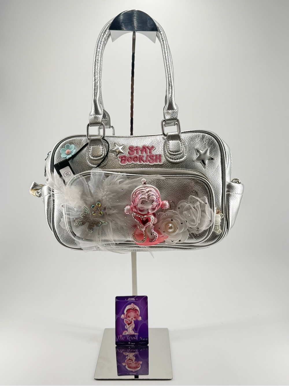 Skull panda the sound Silver “the trust” Metallic Handbag with Charms
